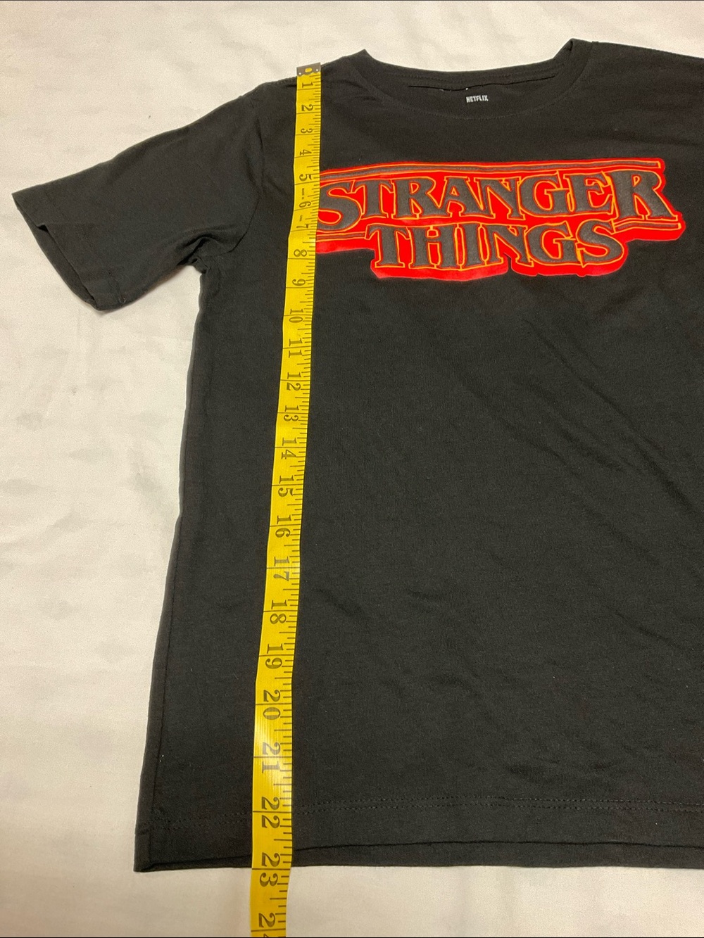 Boy’s Netflix Black Tee with Red and Orange Stranger Things Logo Size L 10/12 - Picture 2 of 5